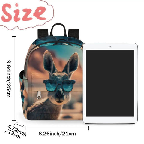 Front view of a Mini Backpack Purse For Women With Adjustable Straps featuring a kangaroo with sunglasses design, next to a tablet for size comparison.