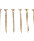 Close-up view of six metallic wood screws with flat head and threaded body, gold tone, suitable for woodworking and assembly tasks.