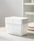 Clear Plastic Storage Bins With White Snap On Lids Set Of Ten stacked vertically, showcasing six quart capacity and sturdy design.