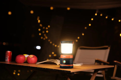 Beast Bright Rechargeable LED Camping Lantern 1800 Lumens with four light modes on a table in outdoor setting