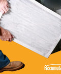 Person installing MERV 8 Pleated Replacement Air Filter 14x18x1 For AC And Furnace, high efficiency HVAC filter in unit.