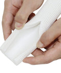 Close-up of foam pipe insulation tubing, white, showing soft handle grip and waterproof moisture-proof surface.