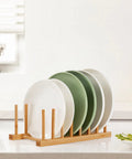 2 Pack Premium Bamboo Dish Rack And Plate Holder With 7 Slots To Level Up Your Kitchen Game displaying plates on a wooden organizer.