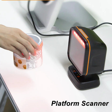 Hand using Desktop Platform Barcode Scanner with CMOS auto sensing and continuous QR reading, 640x480 resolution, USB Type B.