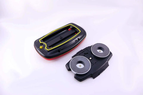 Underside view of Lite It Red LED Trailer Light With Magnetic Mount Battery Powered Wireless Tail Light For Trailers Ultra Low Profile Heavy Duty Magnets Two Modes Flash Or Steady, showing the magnetic mount and battery compartment.