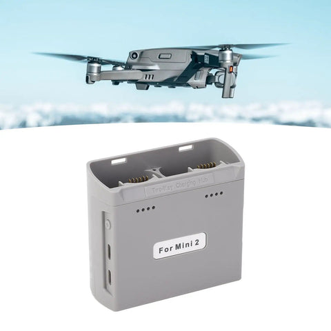 Two Way Battery Charger Hub For Mini 4K Mini 2 Mini SE And Mini 2 SE Drones Two USB Power Adapters shown with drone flying