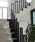 Slick Matte Black U Shape Indoor Outdoor Stair Railing, Heavy Duty Wrought Iron Handrail With Square Tube Cover, Built Tough For Porch Loft And Steps, Tough As Nails Industrial Build 2Pcs Set shown on modern indoor stairs.