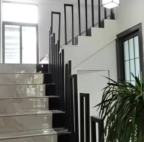 Slick Matte Black U Shape Indoor Outdoor Stair Railing, Heavy Duty Wrought Iron Handrail With Square Tube Cover, Built Tough For Porch Loft And Steps, Tough As Nails Industrial Build 2Pcs Set shown on modern indoor stairs.