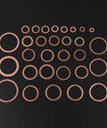 Badass 570 Pieces Copper Washers Assortment Kit Includes Flat Sealing Gaskets For Heavy Plumbing Mechanical Work High Electrical Conductivity Secure Plastic Storage Box Perfect For Trucks Cars Generators Marine Engines And DIY Repair Projects Today. copper washers assortment on black background