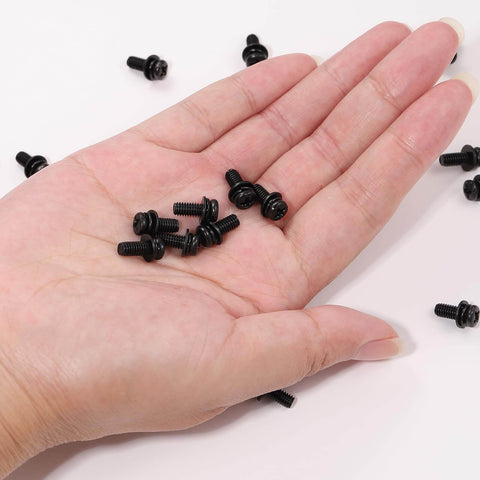 Hand holding M4x10mm VESA Screws Set with lock washers and flat washers, black finish, suitable for 75x75mm and 100x100mm TV and monitor brackets.