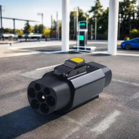 Top Shelf EV Charging Adapter Type 2 To Type 1 Converter 32A 7.2Kw Electric Vehicle Connector on charging station background.