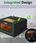Front view of a black integrated laser engraver enclosure with orange-tinted window and green trim.