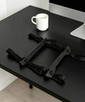 Built Tough Under Desk PC Mount With Quick Lock Straps for securing heavy duty computer tower, shown on a black desk.