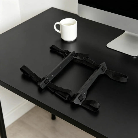 Built Tough Under Desk PC Mount With Quick Lock Straps for securing heavy duty computer tower, shown on a black desk.