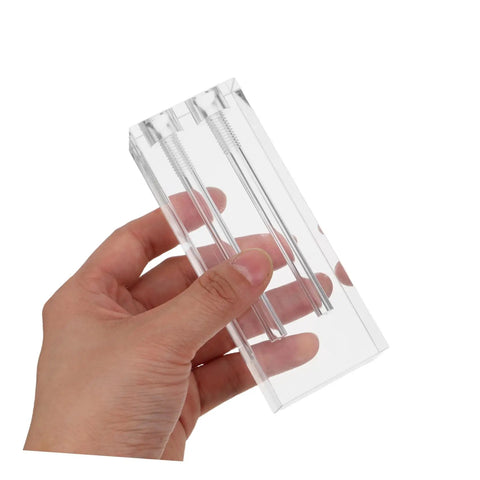 Hand holding clear acrylic Do It Yourself Engine Oil Comparer And Viscosity Demo Stand For Vehicles, dual-tube tester