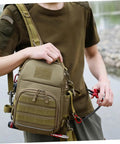Person wearing Camouflage Oxford Cloth Outdoor Fishing Backpack With Large Capacity Tactical Hiking Daypack For Men Women And Boys