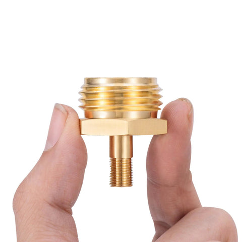 Person holding Beast RV Brass Blow Out Plug Adapter 3/4 Inch GHT Female And Male Garden Hose Quick Connect