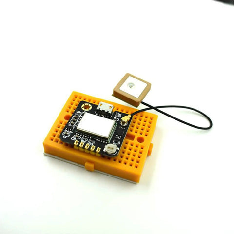 GPS Module GT U7 With USB Port and Active Antenna on yellow breadboard, ideal for Microcontrollers Drones RC Projects