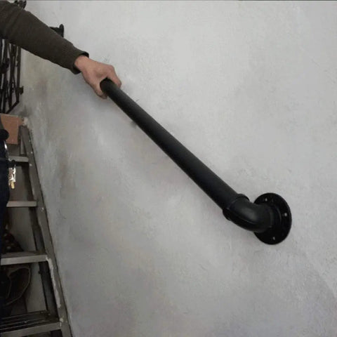 Heavy Duty Rustic Industrial Pipe Railing And Beefy Wrought Iron Handrail for Porches Decks Stairs installed on wall.