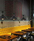 Old School Vintage Inspired Round Black Industrial Pendant Light With E27 Socket Wrought Iron Lampshade in a cafe setting