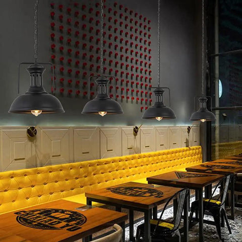 Old School Vintage Inspired Round Black Industrial Pendant Light With E27 Socket Wrought Iron Lampshade in a cafe setting