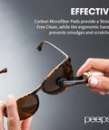 Peeps eyeglass lens cleaner with carbon microfiber pad, black device used on tortoiseshell sunglasses