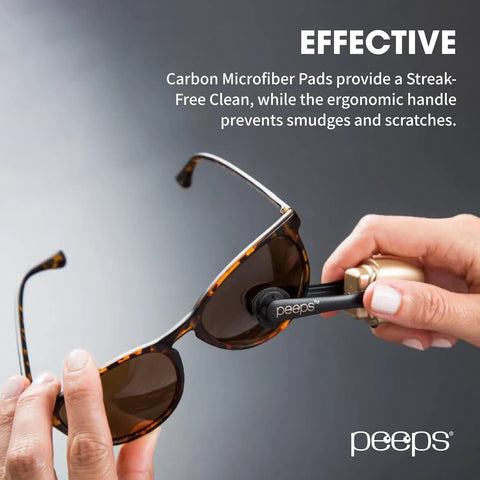 Peeps eyeglass lens cleaner with carbon microfiber pad, black device used on tortoiseshell sunglasses