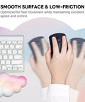 Hand using Rainbow Cloud Mouse Pad Set With Keyboard Wrist Rest And Mouse Wrist Pad Waterproof Large Desk Pad For Keyboard And Mouse Ergonomic 35.4 By 15.7 Inch Wrist Support Must Have Colorful Rainbow Office Accessory