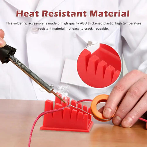 Close-up of Magnetic Helping Hands Soldering Station with five slot wire holder and soldering iron in use, demonstrating heat resistance.