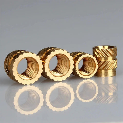 Get Your Hands On These Badass Knurled Insert Nuts Made From Solid Brass For Hot Melt Installation In Wood Or Plastic Strong Threads Hold Tight And Last Forever With M2 Through M6 Sizes Perfect For Any Serious DIY Job You Need Right Now, showcasing four brass insert nuts with detailed threading.