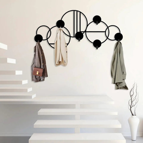 Abstract Metal Wall Hanger With Geometric Coat Hooks, Killer Wall Art For Entryway, Modern Silver Coat Rack Organizer, Smooth Operator Hat Stand Holder 53x26 Inches with coats and bags.