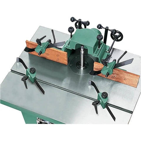 Straight Up 5 Hp Spindle Shaper With Three Quick Swap Arbors And Four Sick Speed Settings Built Tough For Heavy Duty Routing and Custom Woodworking Buildouts, showing precision tooling setup.