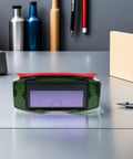 Front view of No Sweat Auto Darkening Welding Goggles With Impact Resistant Lens And Heavy Duty Debris Shield Eye Protection on a table.