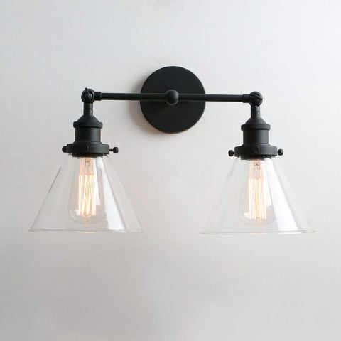 Two Light Industrial Wall Sconce In Antique Black With 7.3 Inch Cone Clear Glass Shade 180 Degree Adjustable E26 Base Compatible With LED Incandescent CFL Halogen Bulbs Bulbs Not Included Handmade Glass Lampshade