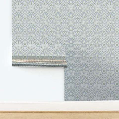 Upgrade Your Interior Game With This Rad Boho Ikat Soft Silver Metallic Wallpaper Featuring A Chic Fibrous Finish That Adds Major Bling To Any Walls, showing the silver and blue pattern in a home setting.
