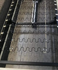 Upgrade Your Dated Living Room Setup With These Badass Upholstery Springs And Z Clips For Couch Chair Restoration Fixes Wobbly Seating Smooth And No Sweat Guaranteed To Hold Tight Forever - Close-up of steel springs and clips in a couch frame.