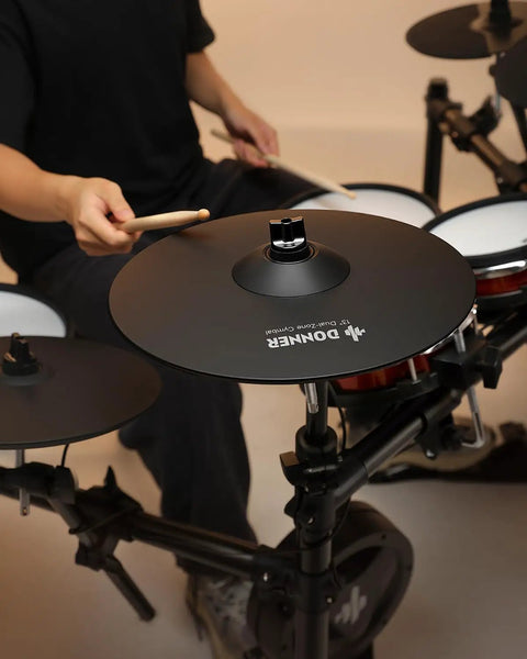 13-inch dual-zone mute cymbal on electronic drum kit with bow and edge triggers, CYB-13D model in use.