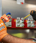 Person using Long Ball End Hex Key Wrench Set With SAE And Metric, L Style, Color Coded Powder Coat in electrical panel repair