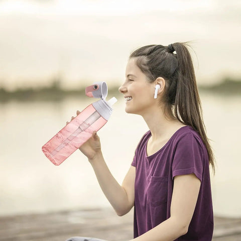 Woman sipping from bottle with Replacement Mouthpiece Kit For Water Bottles Compatible With Insulated Filtered Water Bottles Includes 3 Silicone Mouthpieces And 4 Filter Cartridges Easy Swap Bottle Parts Upgrade Food Grade Silicone.