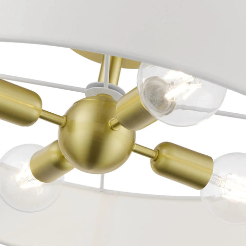 Close-up of light sockets on 4 Light Brushed Nickel Semi Flush Mount Ceiling Fixture With Off White Fabric Hardback Shade, Venlo Collection.