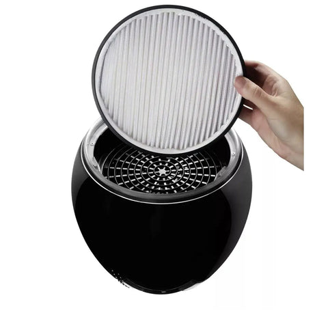 HEPA filter being placed into Compact Small Room HEPA Type Air Purifier With 360 Degree Intake For Up To 112 Sq Ft Black Finish