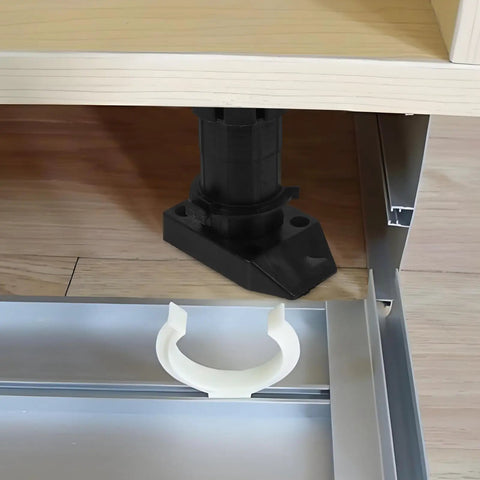 Close-up of Adjustable Cabinet Leveling Feet 4 Pack Black ABS Furniture Legs installed under cabinet for stability