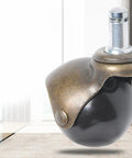 4pcs Inch Antique Bronze Ball Caster Wheel Swivel Chair Furniture close-up showing a black ball wheel with metal bracket.