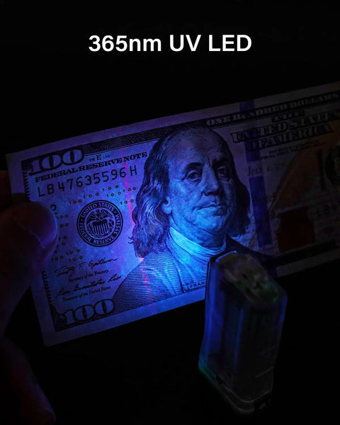 Image showing 365nm UV LED lighting up a $100 bill, demonstrating the Rechargeable EDC Flashlight With USB C 700 Lumen Dope Keychain Light's UV feature.