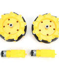 Front view of two yellow 80mm mecanum wheels with black rubber tires and yellow hubs, shown with two matching DC motors.