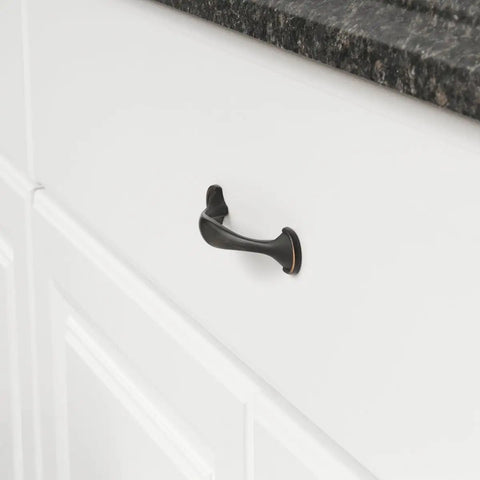 Oil Rubbed Bronze Rounded Foot Cabinet Pulls 4.63 Inches Long With 3 Inch Center, 1 Inch Projection, on white drawer