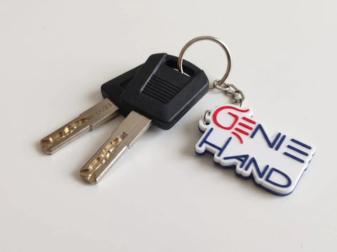 Close-up of two keys on a keyring with a 'GENIE HAND' tag, used for Heavy Duty Digital Timer Lockbox.