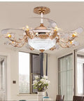 Luxury European Ceiling Fan Light With Remote Control And Invisible Blade Fan Chandelier In Trace Gold Finish Boasting 8 E27 Bulbs And 42 Inch Size For Epic Vibe in a modern dining room.