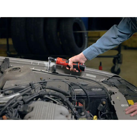 Pro Grade 3/8 Inch Cordless Ratchet With 12 Volt Lithium Ion Pack delivers 35 Ft Lbs torque used on a car engine.