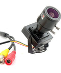 Compact Bullet Security Camera 960H 1000TVL HD with 2.8 to 12mm varifocal lens and metal case displayed with connecting cables.